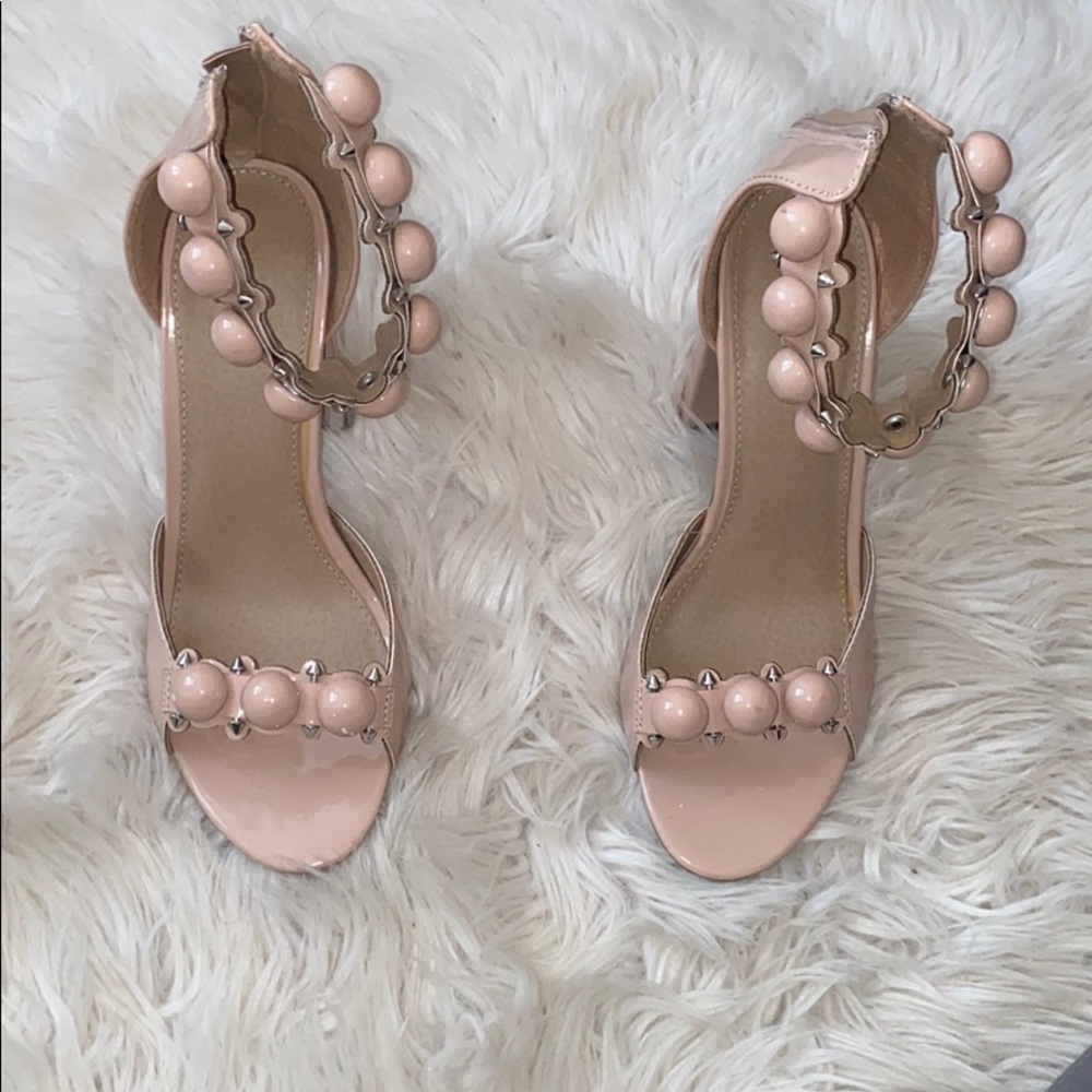 Patent studded heels